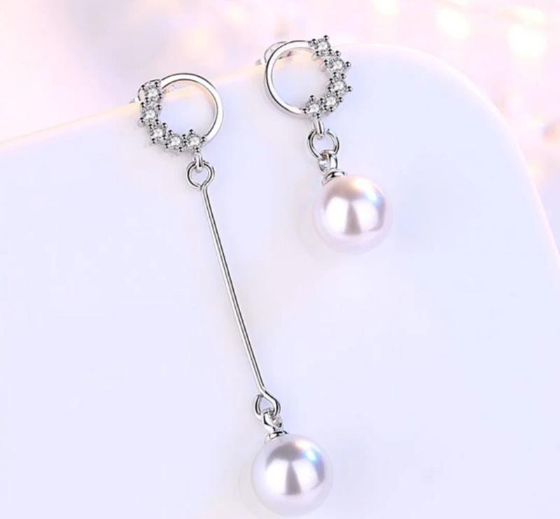 Асимметричные серьги с жемчугом: правила ношения несимметричных украшений