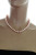 Ожерелье из розового рисообразного речного жемчуга. Жемчужины 7,5-8 мм